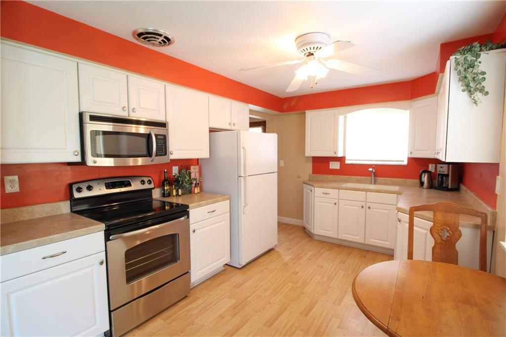 637 Greenlee Road Pittsburgh, PA 15227 - Photo 9 of 25 The fresh as white linen remodeled kitchen has space for your favorite bistro table