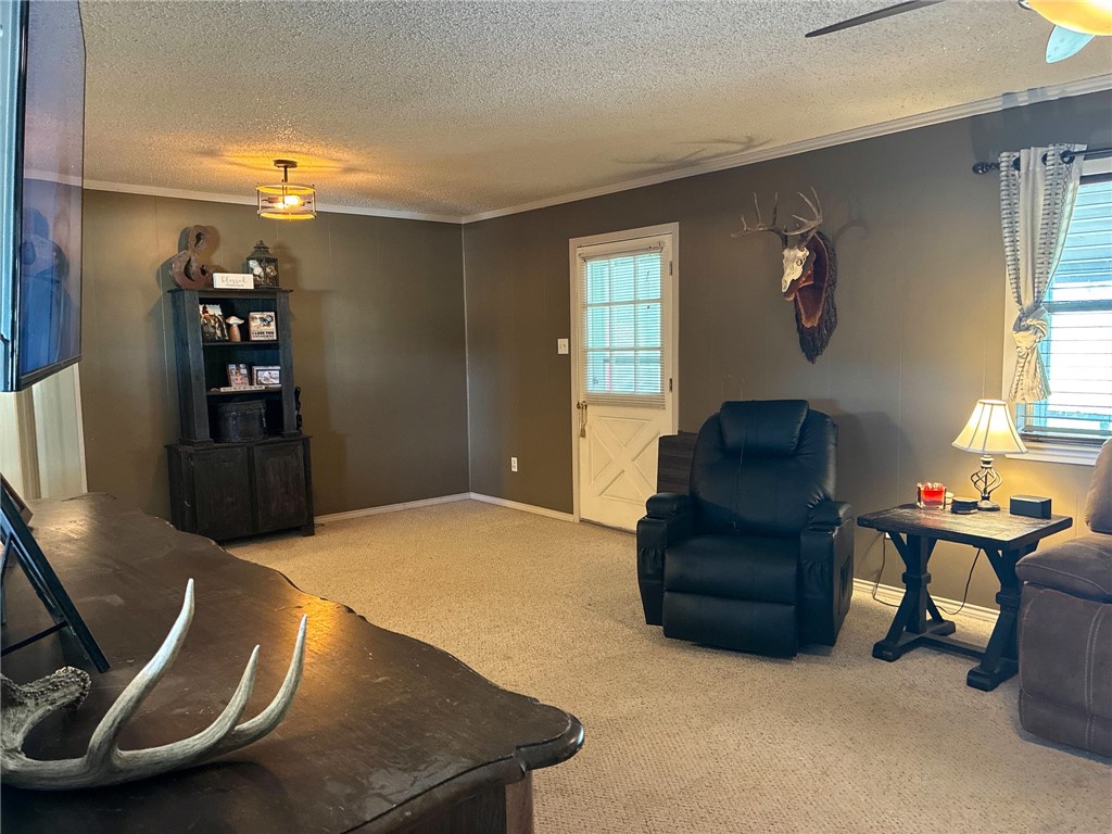 3010 North Interstate 37 Access Three Rivers, TX 78071 - Photo 14 of 29 a living room with furniture a window and gym equipment