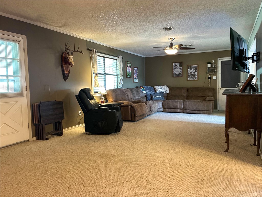 3010 North Interstate 37 Access Three Rivers, TX 78071 - Photo 17 of 29 a living room with furniture and a flat screen tv