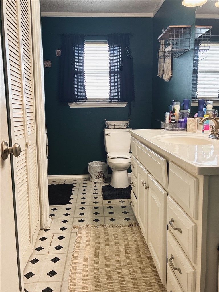 3010 North Interstate 37 Access Three Rivers, TX 78071 - Photo 21 of 29 a bathroom with a sink a toilet a shower and a window