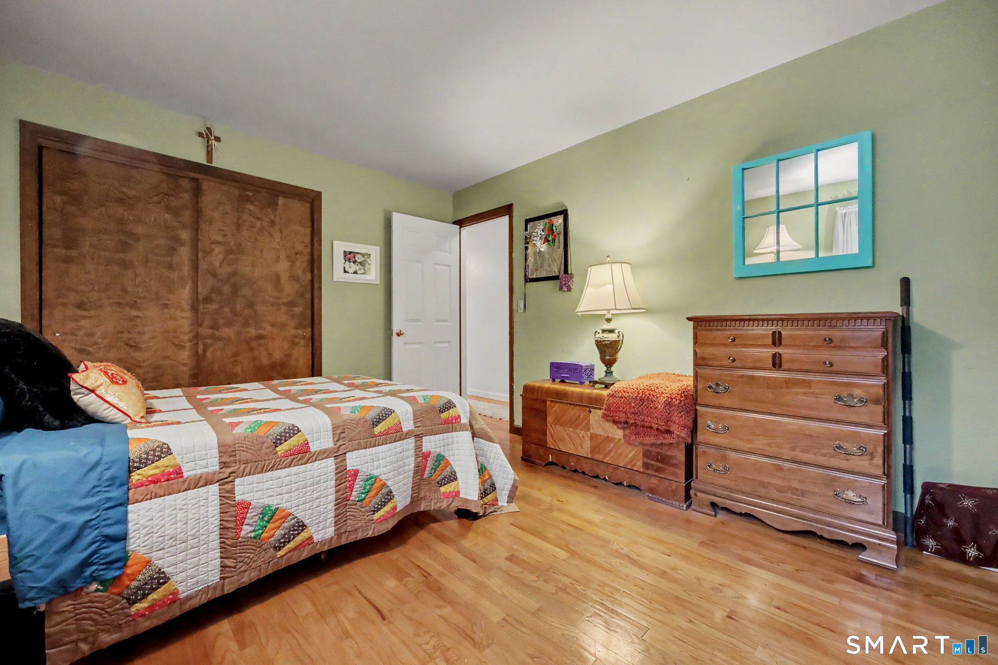571 Wheeler Road Monroe, CT 06468 - Photo 19 of 40 a bedroom with a bed and a dresser
