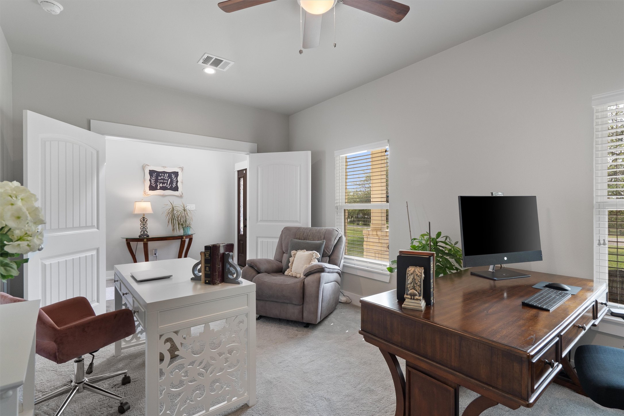 13105 Rooster Springs Road Austin, TX 78737 - Photo 9 of 38 This office features carpeted flooring, a ceiling fan, and two windows providing natural light