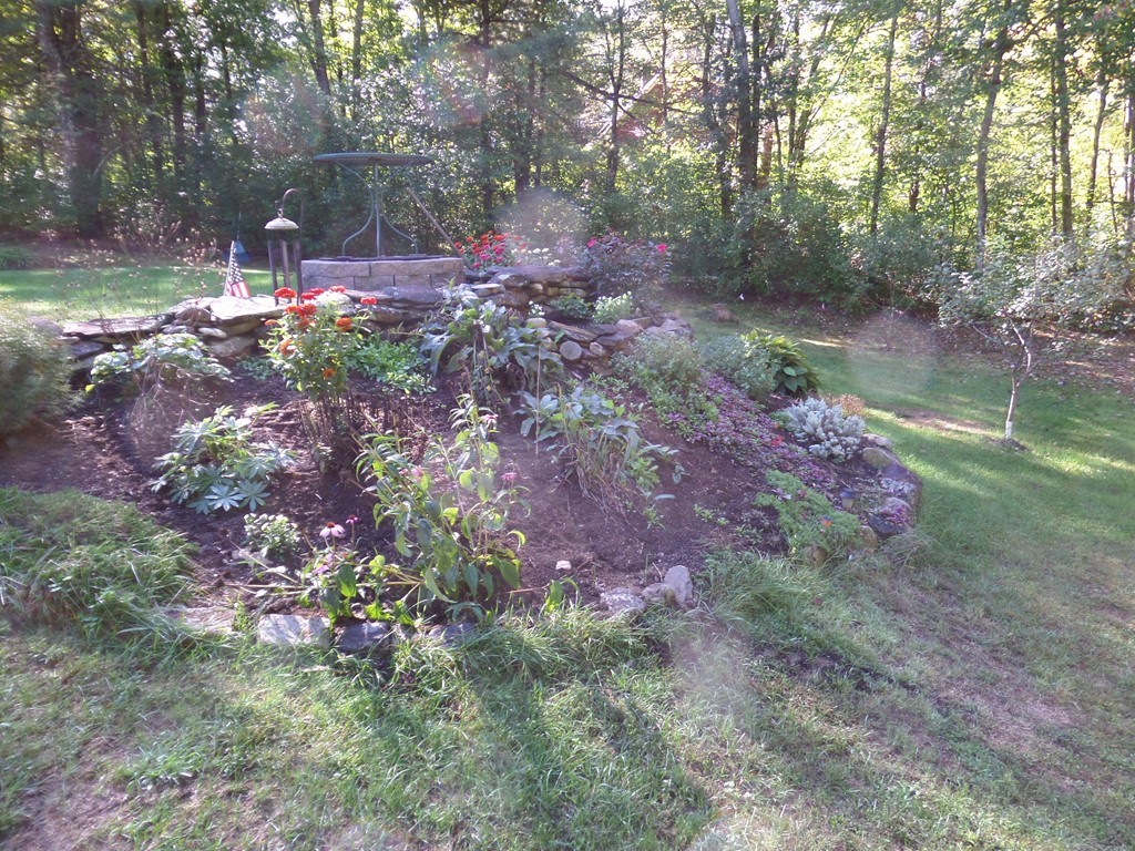 550 South Barre Road Barre, MA 01005 - Photo 7 of 26 a backyard of a house with lots of green space
