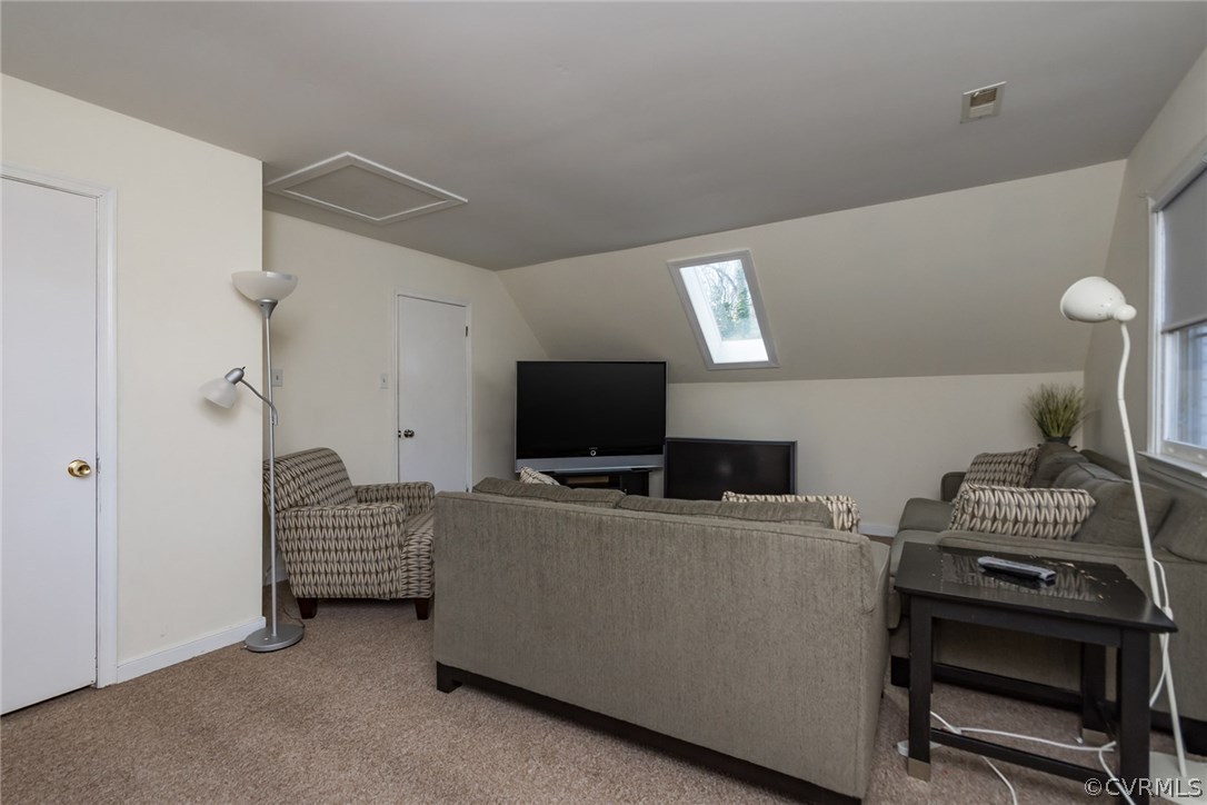 5009 Tulip Oak Road Chesterfield, VA 23832 - Photo 20 of 35 a living room with furniture and a flat screen tv