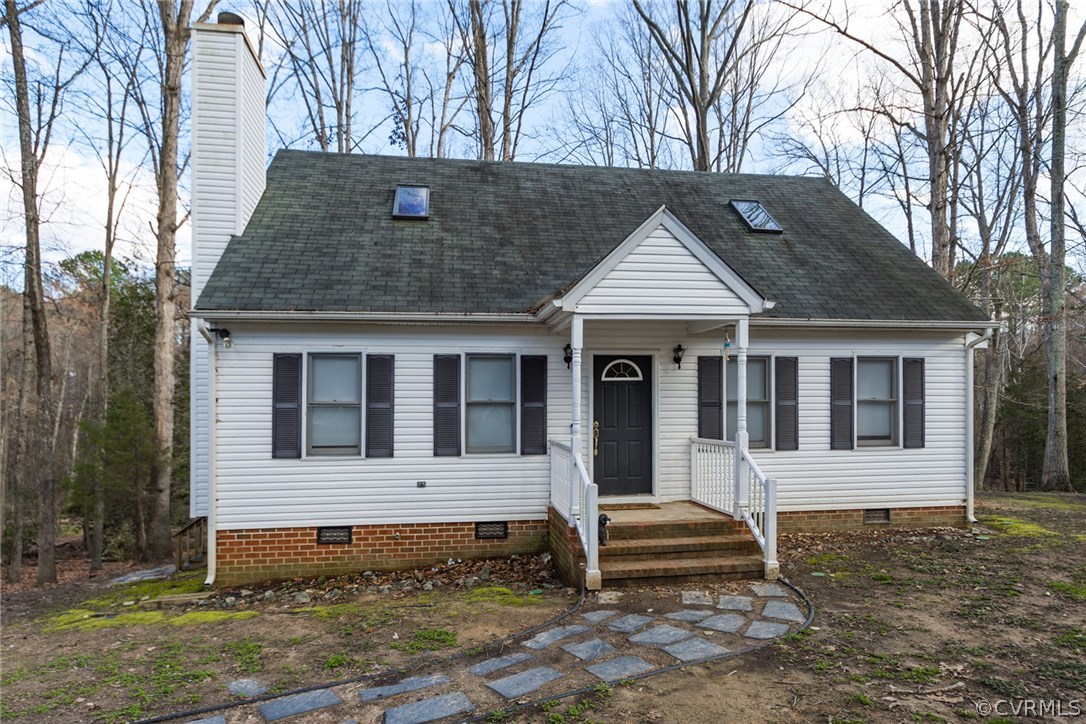 5009 Tulip Oak Road Chesterfield, VA 23832 - Photo 2 of 35 a front view of a house with a yard