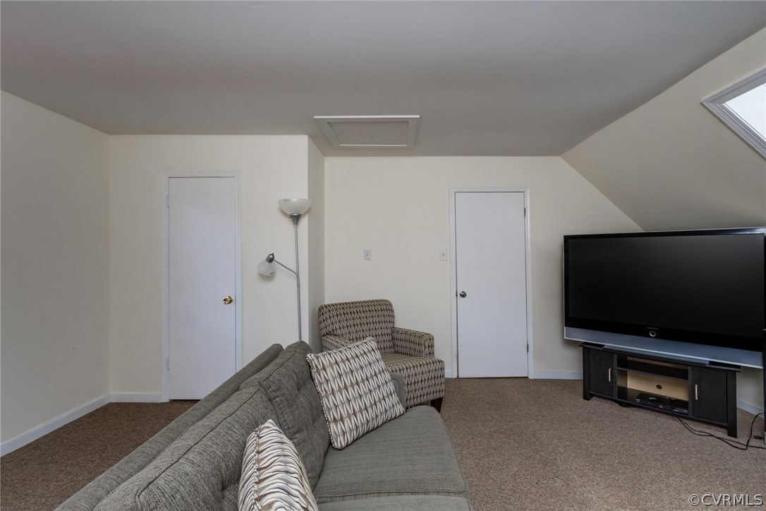 5009 Tulip Oak Road Chesterfield, VA 23832 - Photo 22 of 35 a living room with furniture and a flat screen tv