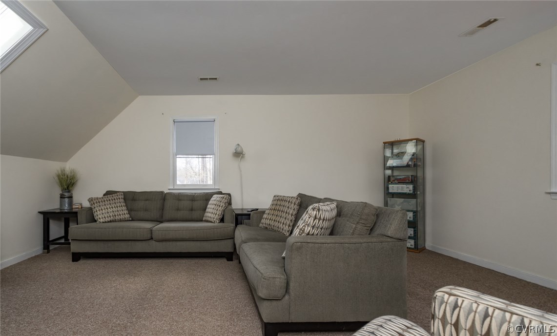 5009 Tulip Oak Road Chesterfield, VA 23832 - Photo 24 of 35 a living room with furniture and a couch