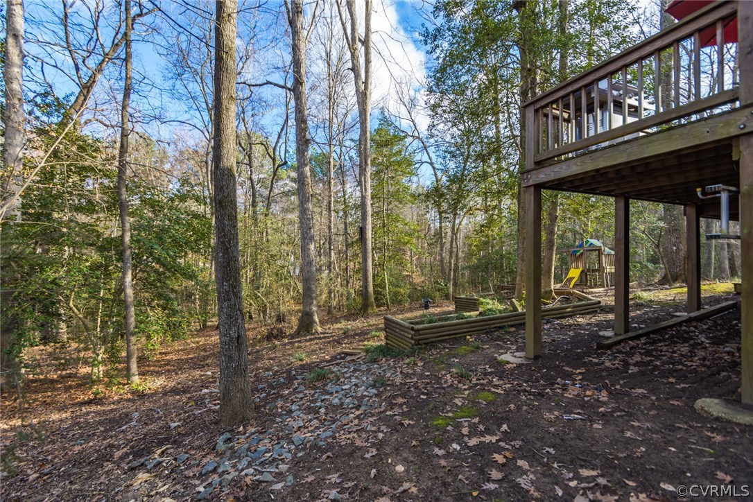 5009 Tulip Oak Road Chesterfield, VA 23832 - Photo 31 of 35 a view of a house with backyard and sitting area