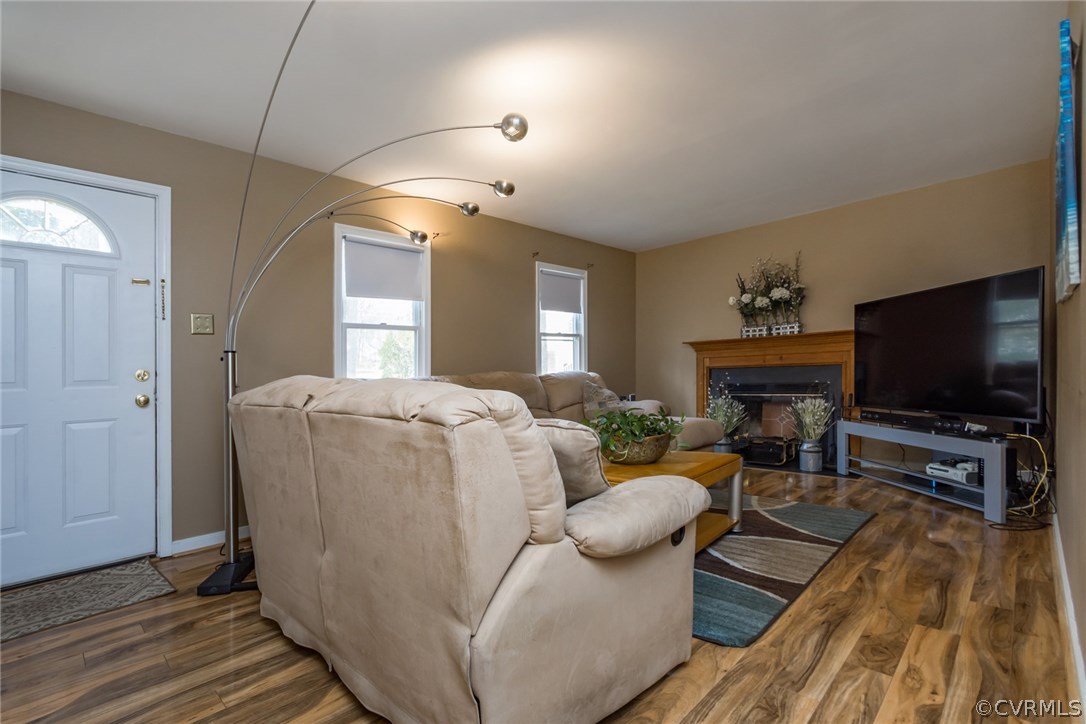 5009 Tulip Oak Road Chesterfield, VA 23832 - Photo 5 of 35 a living room with furniture and a flat screen tv