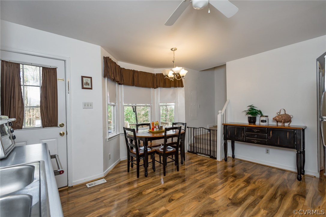 5009 Tulip Oak Road Chesterfield, VA 23832 - Photo 8 of 35 a view of a dining room with furniture and window
