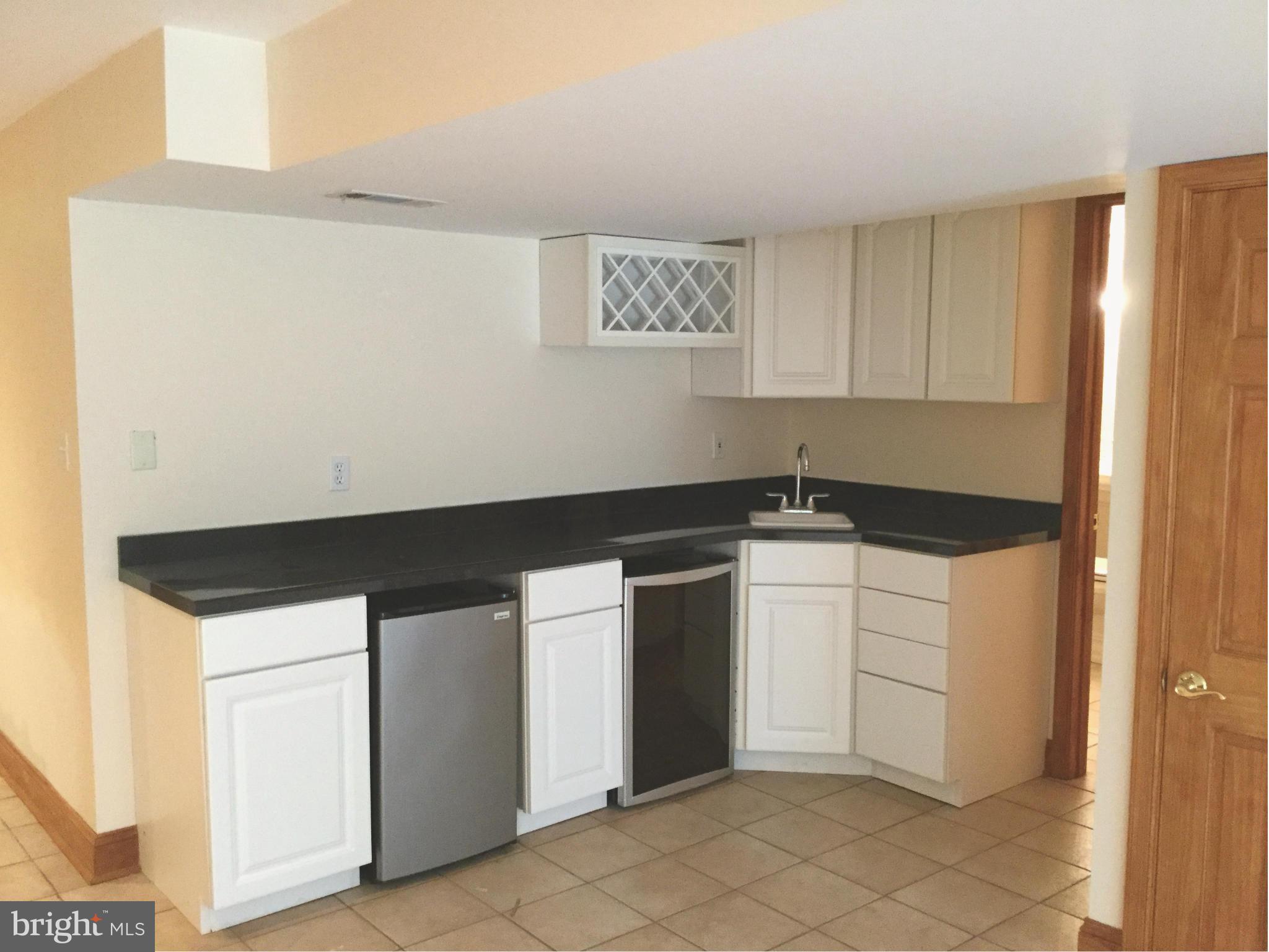 3045 Wheatfield Road Finksburg, MD 21048 - Photo 21 of 27 LOWER LEVEL WET BAR,WINE COOLER AND FRIDGE