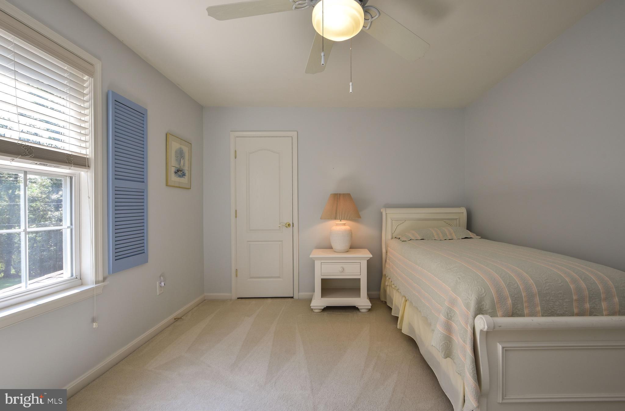 6865 North Stuart Road King George, VA 22485 - Photo 19 of 30 a bedroom with a bed and a window
