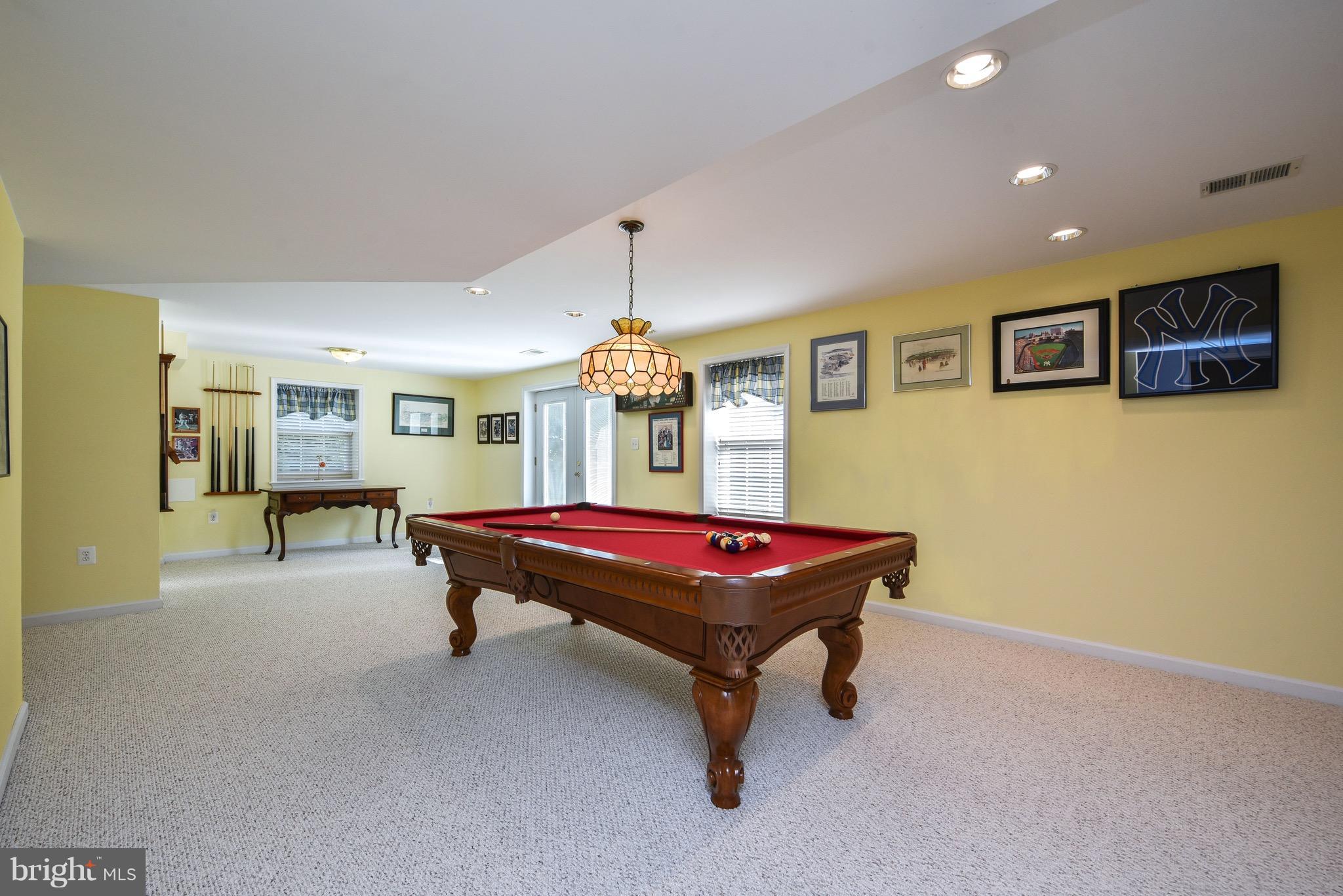 6865 North Stuart Road King George, VA 22485 - Photo 26 of 30 a room with pool table and windows
