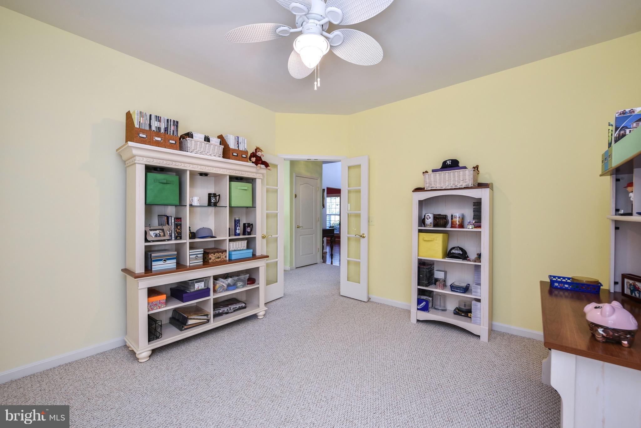 6865 North Stuart Road King George, VA 22485 - Photo 7 of 30 a room with furniture and a chandelier
