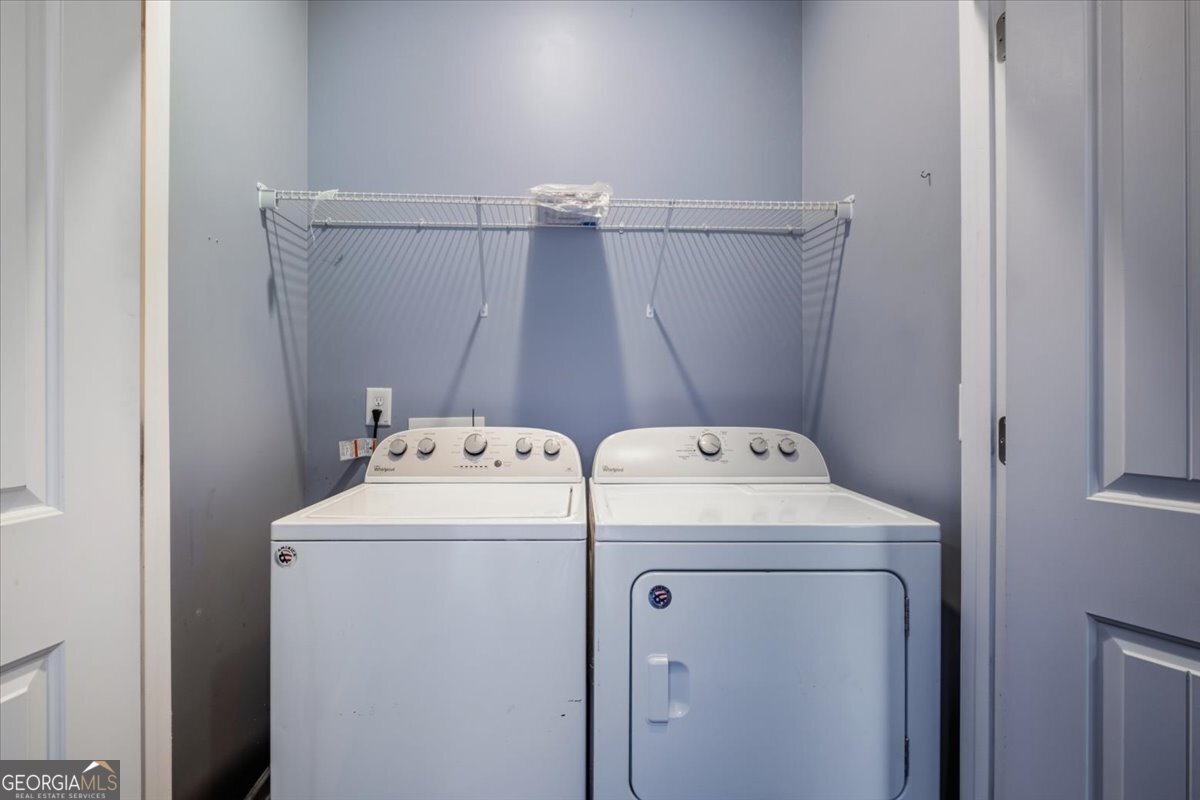 15 Grandberry Court Southwest Rome, GA 30165 - Photo 21 of 23 a utility room with dryer and washer