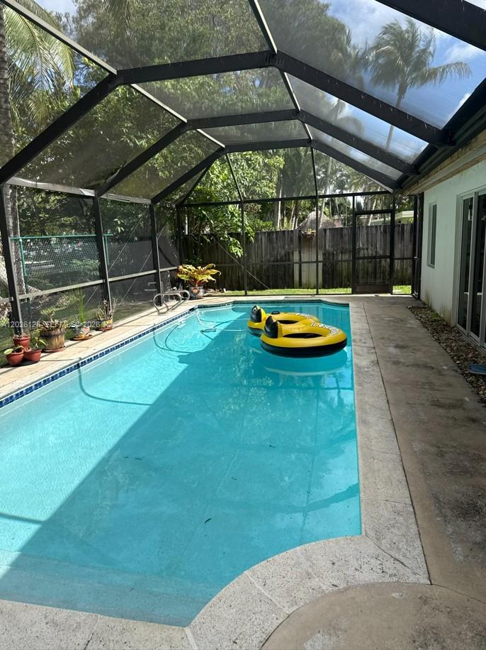 8040 Southwest 63rd Place Miami, FL 33143 - Photo 9 of 15 a view of swimming pool with a patio