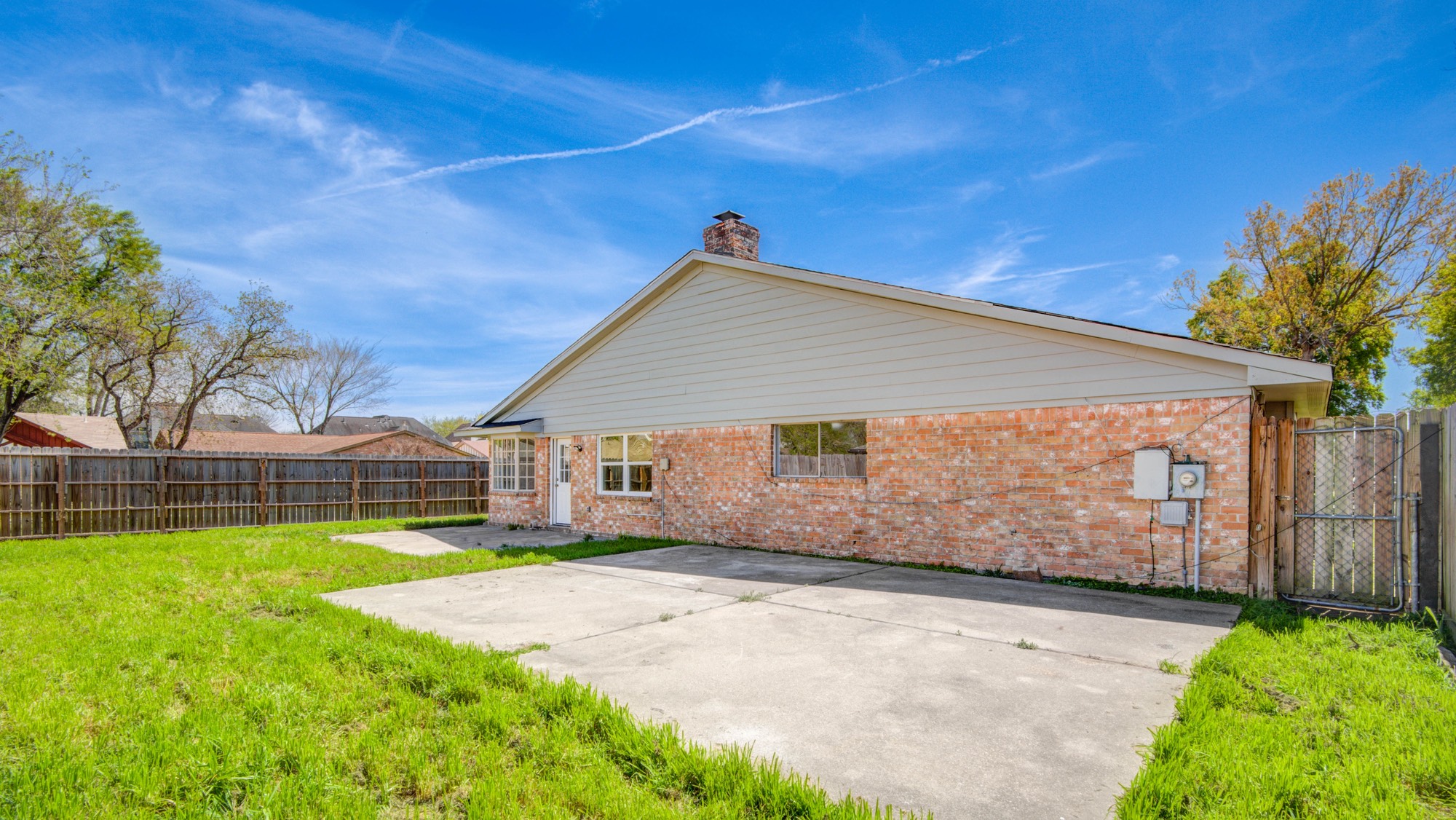 13747 Rampchester Lane Houston, TX 77015 - Photo 21 of 24 a view of a house with a yard and plants