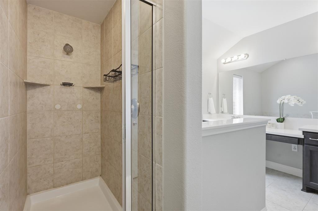 717 Allbright Road Celina, TX 75009 - Photo 21 of 37 Garden tub, dual sinks, linen closet. Separate walk in shower