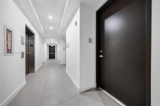 wooden floor in a hall with an entryway