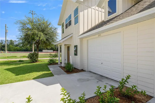 a view of a house with a garden