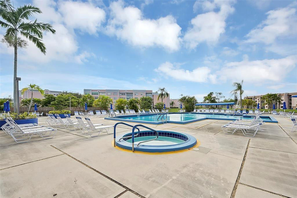 2541 North Nob Hill Road, Unit 206 Sunrise, FL 33322 - Photo 28 of 44 a view of swimming pool with seating space
