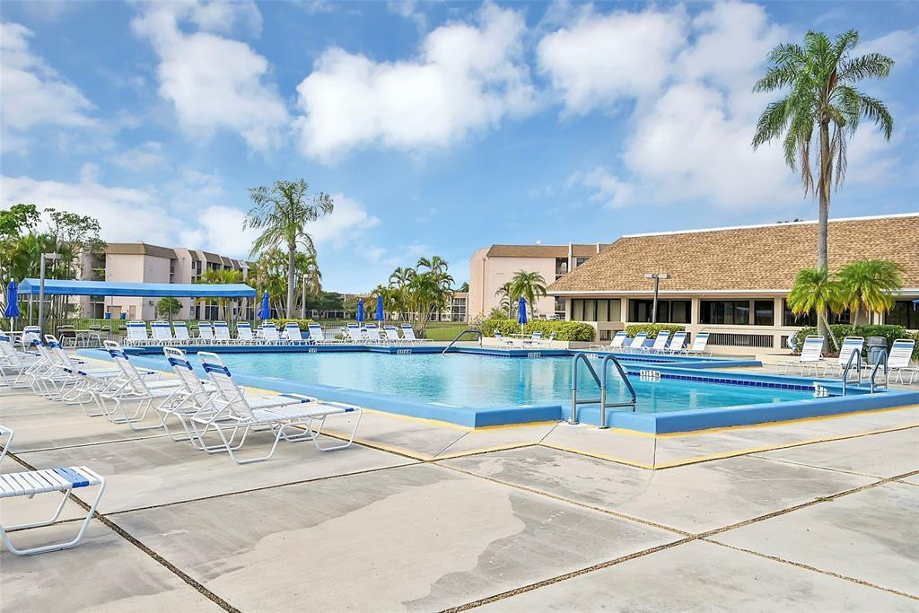 2541 North Nob Hill Road, Unit 206 Sunrise, FL 33322 - Photo 39 of 44 a view of house with outdoor space and swimming pool