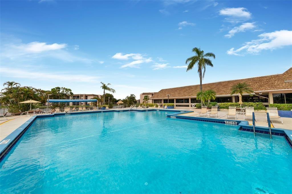 2541 North Nob Hill Road, Unit 206 Sunrise, FL 33322 - Photo 40 of 44 a view of a lake with a house