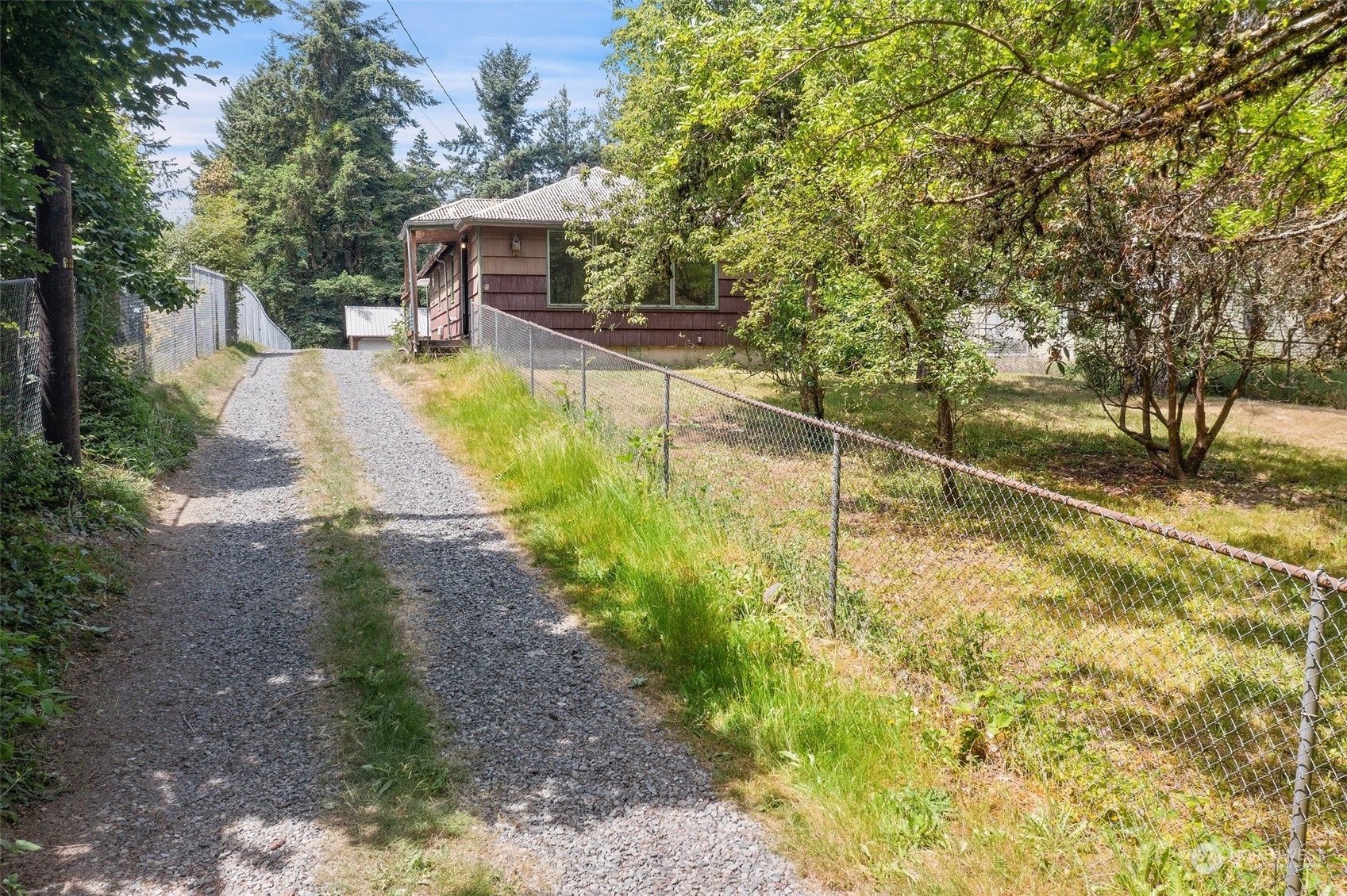 a view of a patio with chairs and a table and chairs
