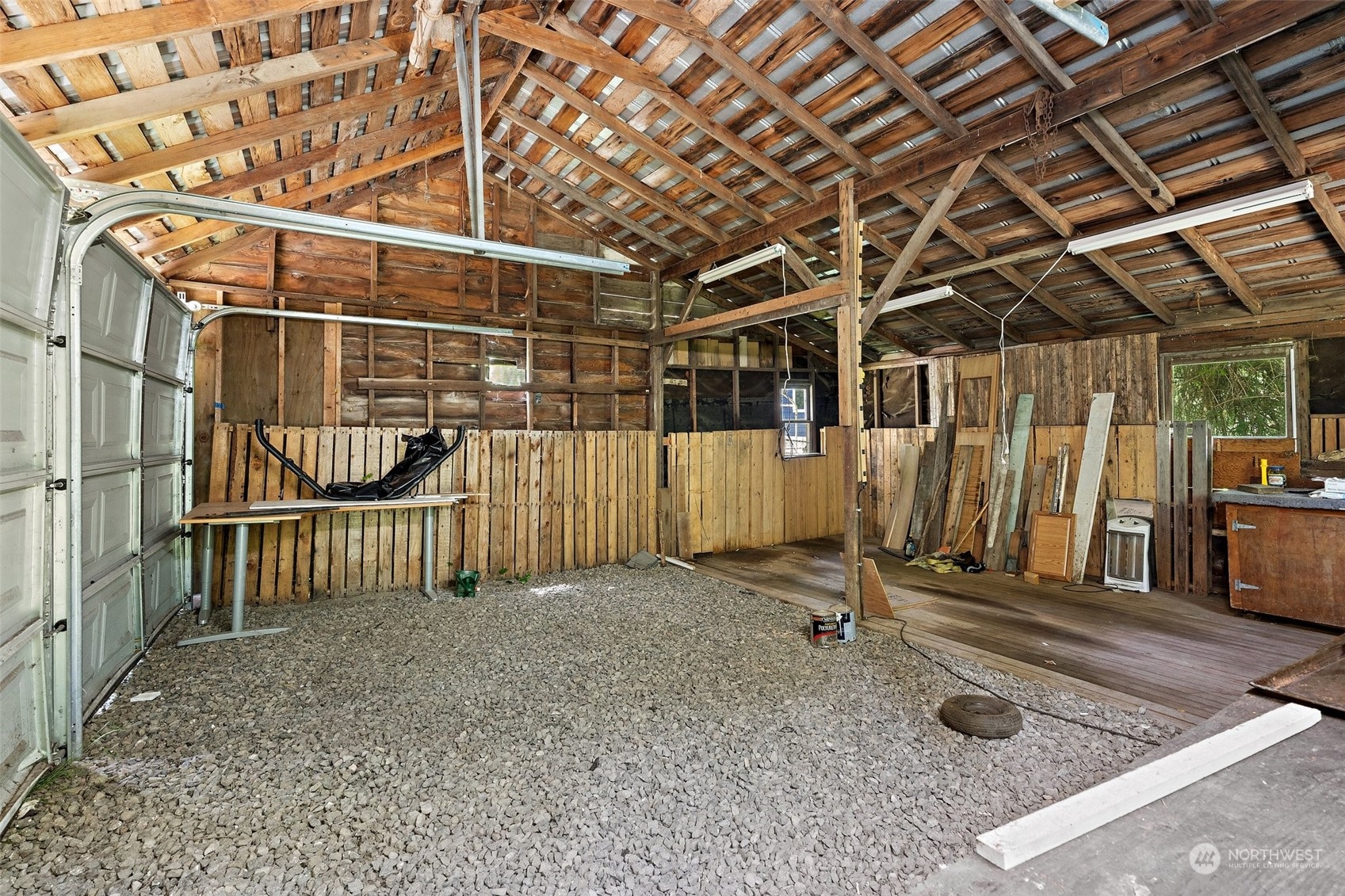 2515 Rocky Point Road Northwest Bremerton, WA 98312 - Photo 23 of 29 a view of a room with wooden walls