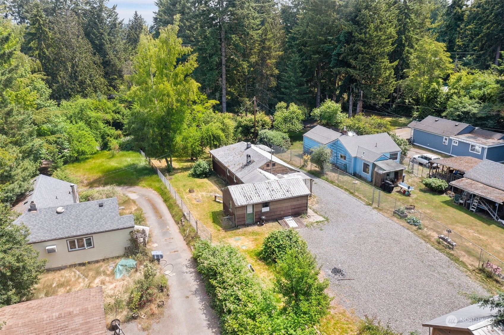 2515 Rocky Point Road Northwest Bremerton, WA 98312 - Photo 24 of 29 an aerial view of a house with a garden