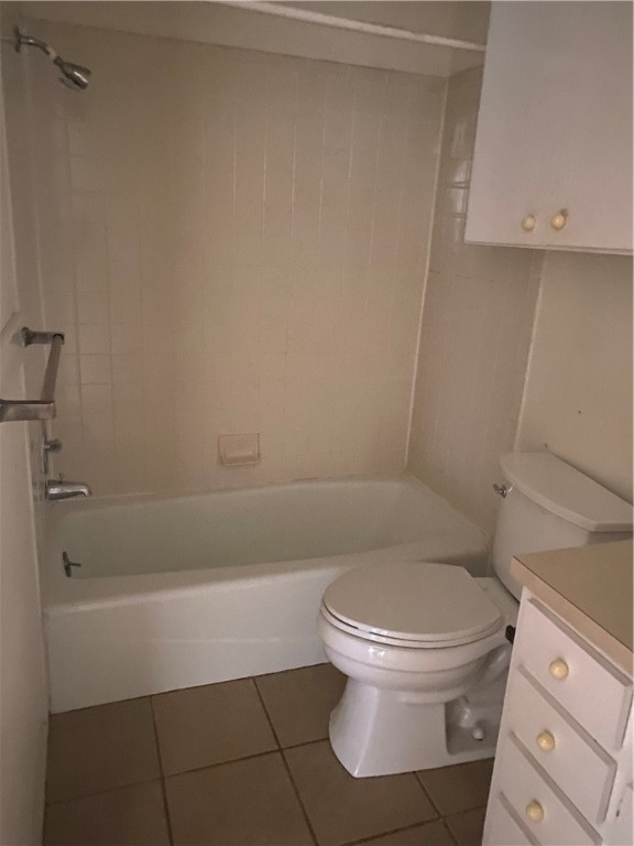 612 Park Place, Unit 301 Austin, TX 78705 - Photo 12 of 25 a white toilet sitting next to a bath tub