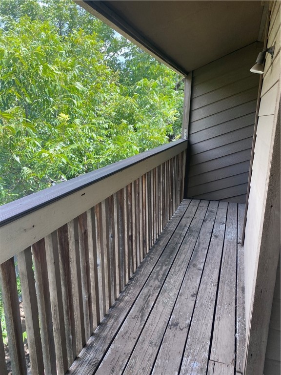 612 Park Place, Unit 301 Austin, TX 78705 - Photo 23 of 25 a view of balcony with wooden floor
