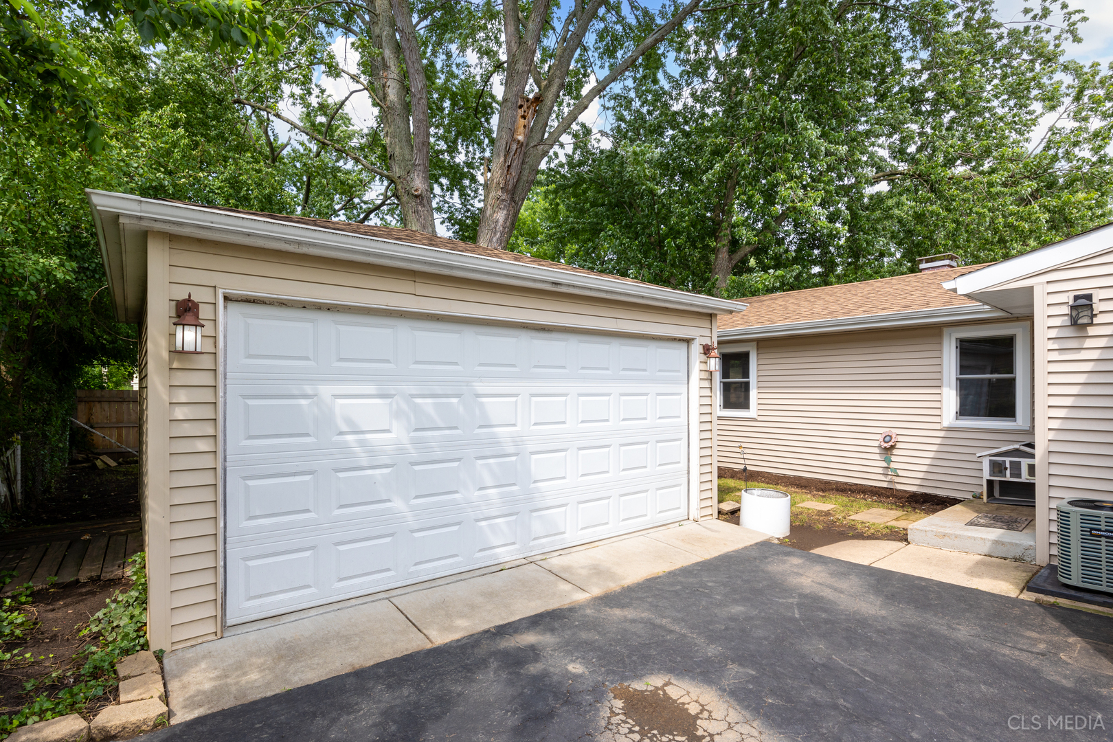 110 Cedar Circle Streamwood, IL 60107 - Photo 20 of 28 a view of a house with a garage