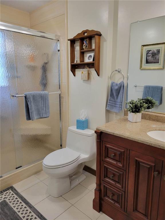 1855 Alamae Lakes Road Washington, PA 15301 - Photo 12 of 21 a bathroom with a toilet a sink and mirror