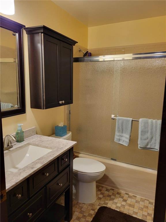 1855 Alamae Lakes Road Washington, PA 15301 - Photo 15 of 21 a bathroom with a sink a toilet and mirror