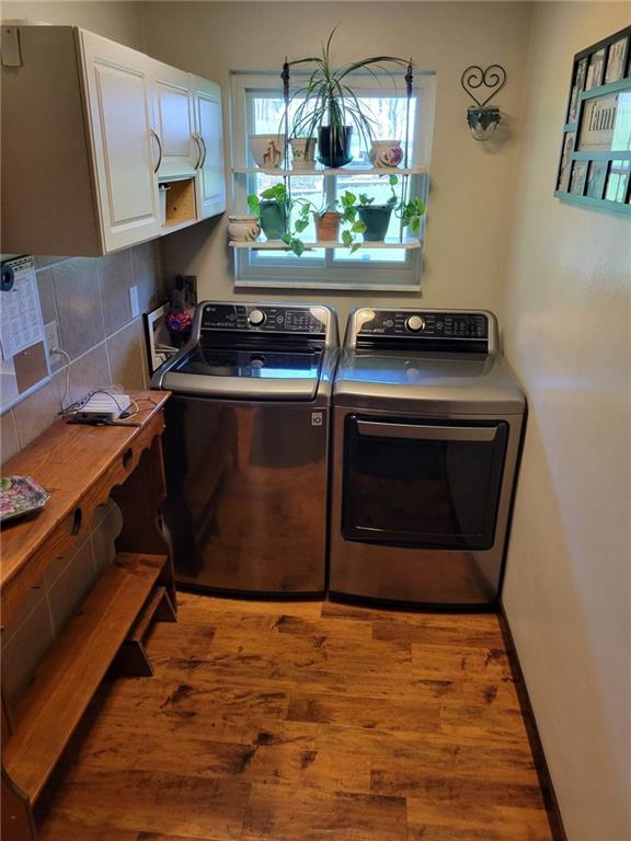1855 Alamae Lakes Road Washington, PA 15301 - Photo 17 of 21 a kitchen with stainless steel appliances granite countertop a stove and a wooden cabinets