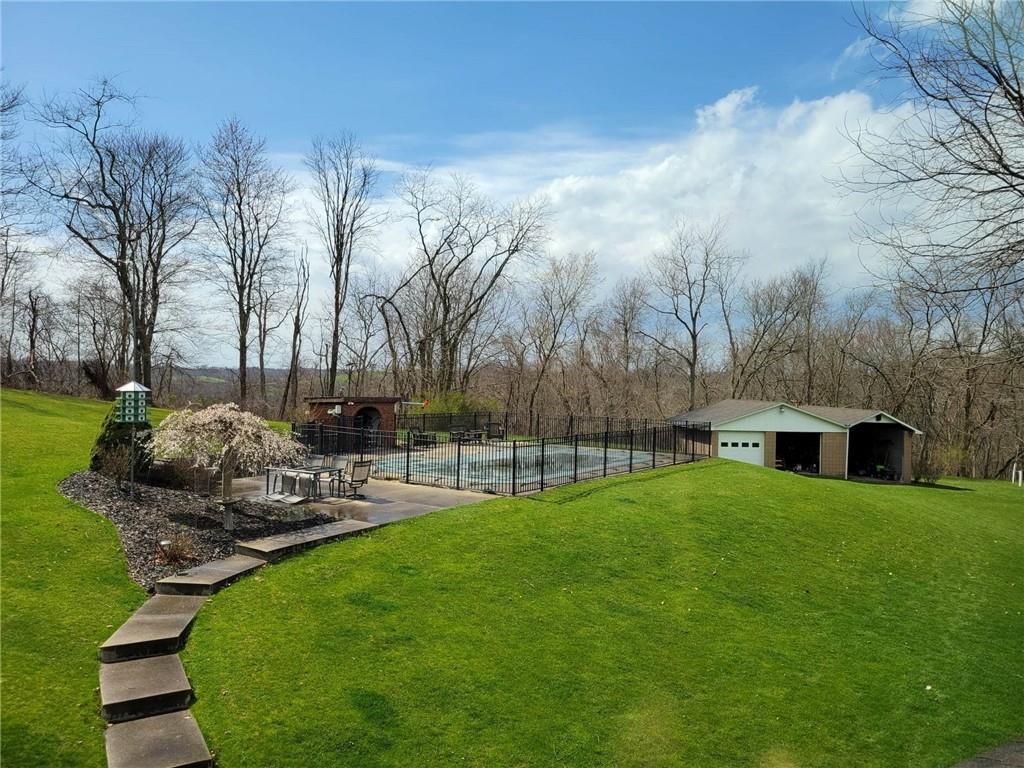 1855 Alamae Lakes Road Washington, PA 15301 - Photo 18 of 21 a view of a backyard with sitting area