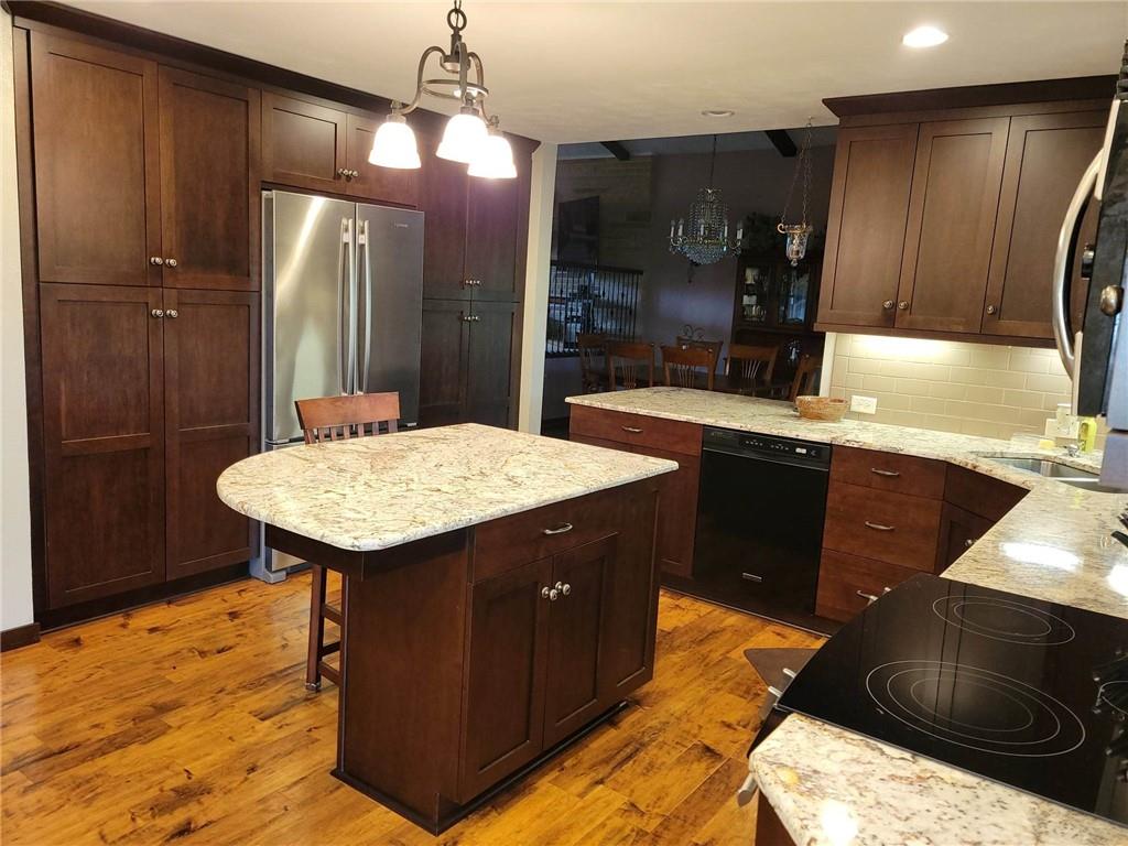 1855 Alamae Lakes Road Washington, PA 15301 - Photo 3 of 21 a kitchen with a sink a counter space and stainless steel appliances