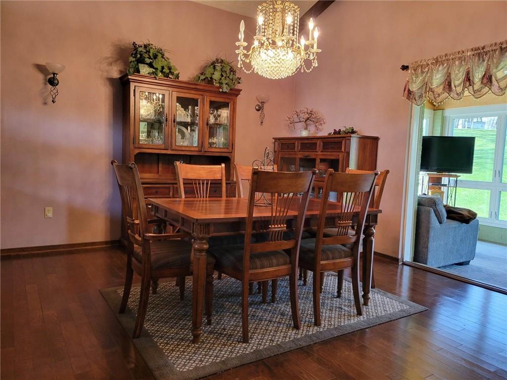 1855 Alamae Lakes Road Washington, PA 15301 - Photo 5 of 21 a view of a dining room with furniture and wooden floor