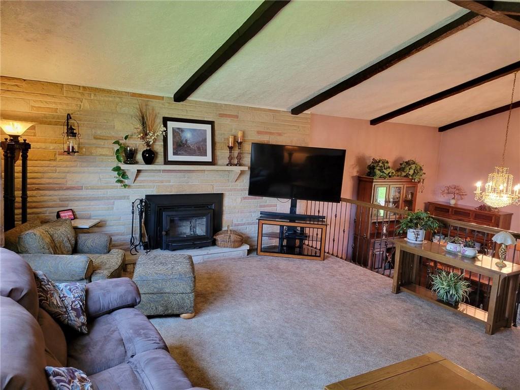 1855 Alamae Lakes Road Washington, PA 15301 - Photo 6 of 21 a living room with furniture and a flat screen tv