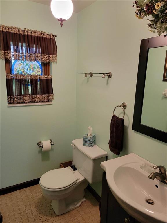 1855 Alamae Lakes Road Washington, PA 15301 - Photo 9 of 21 a bathroom with a sink and a toilet