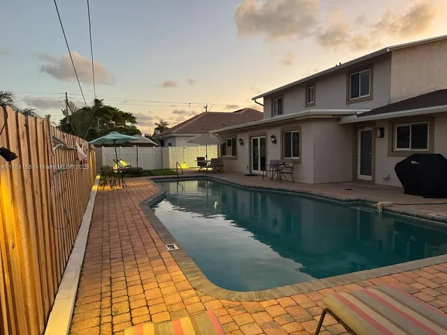a view of a lake with a house
