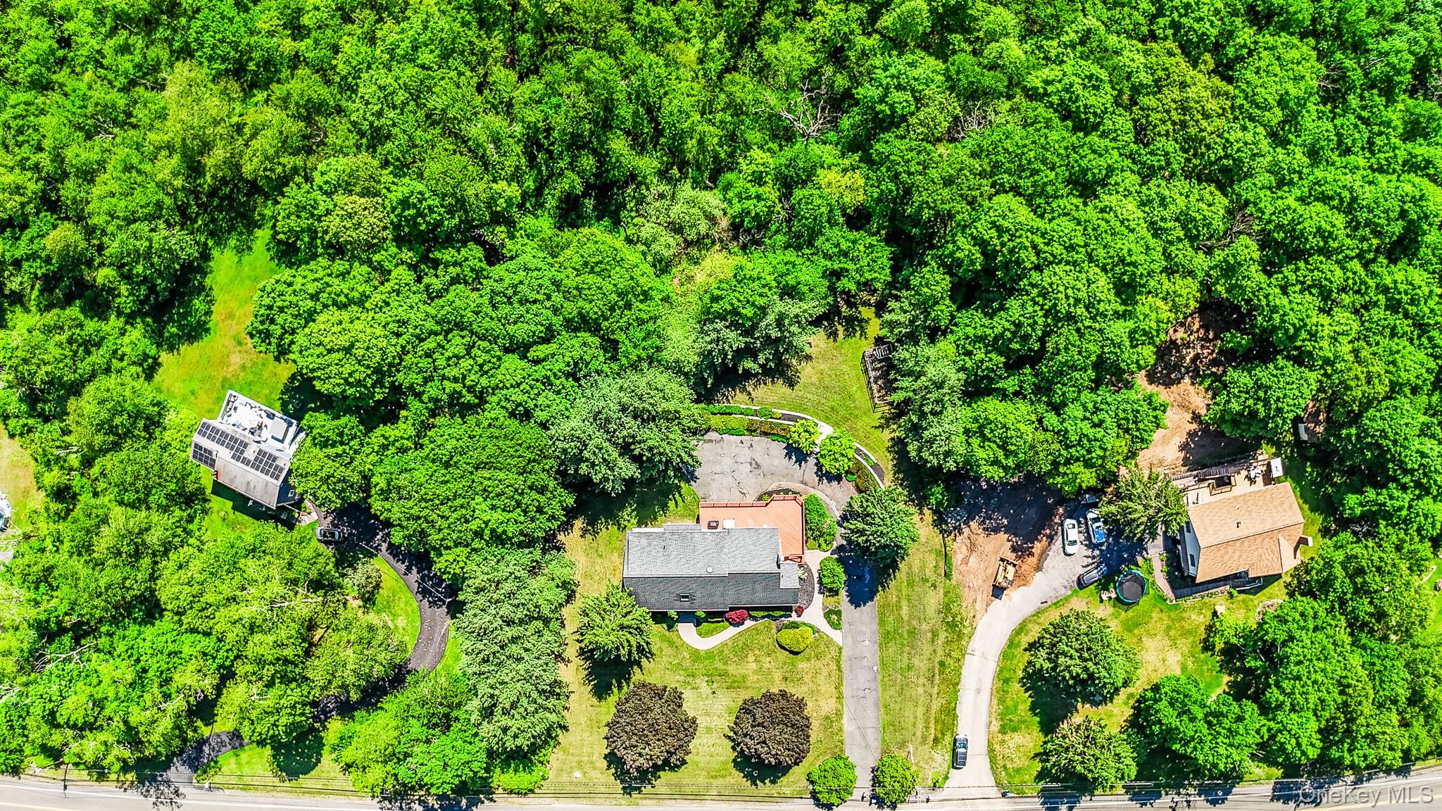 214 West Mombasha Road Monroe, NY 10950 - Photo 41 of 43 an aerial view of residential house with outdoor space and trees all around