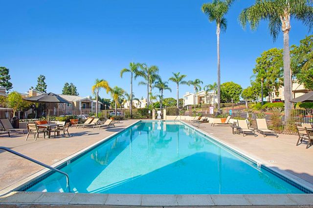 a view of a house with swimming pool