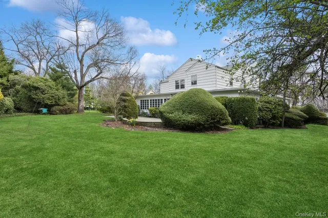 a view of a garden with a fountain