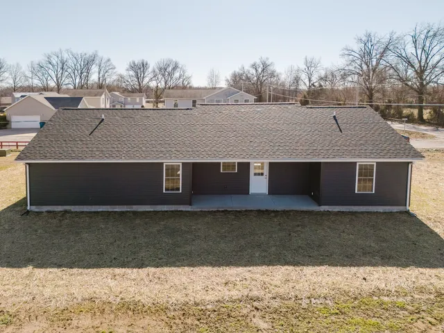 a view of a terrace with furniture