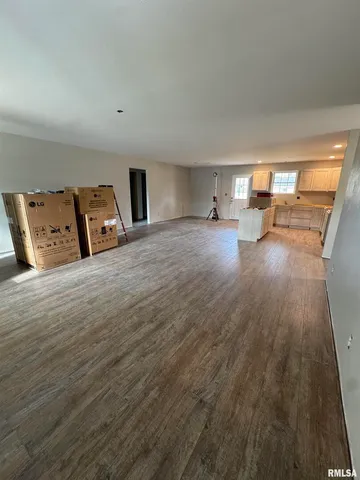 a bedroom with furniture and window