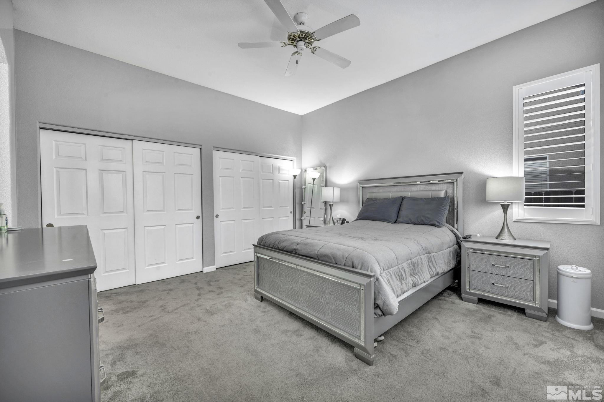 10518 French Meadows Way Reno, NV 89521 - Photo 12 of 34 a bedroom with a bed and a cabinets