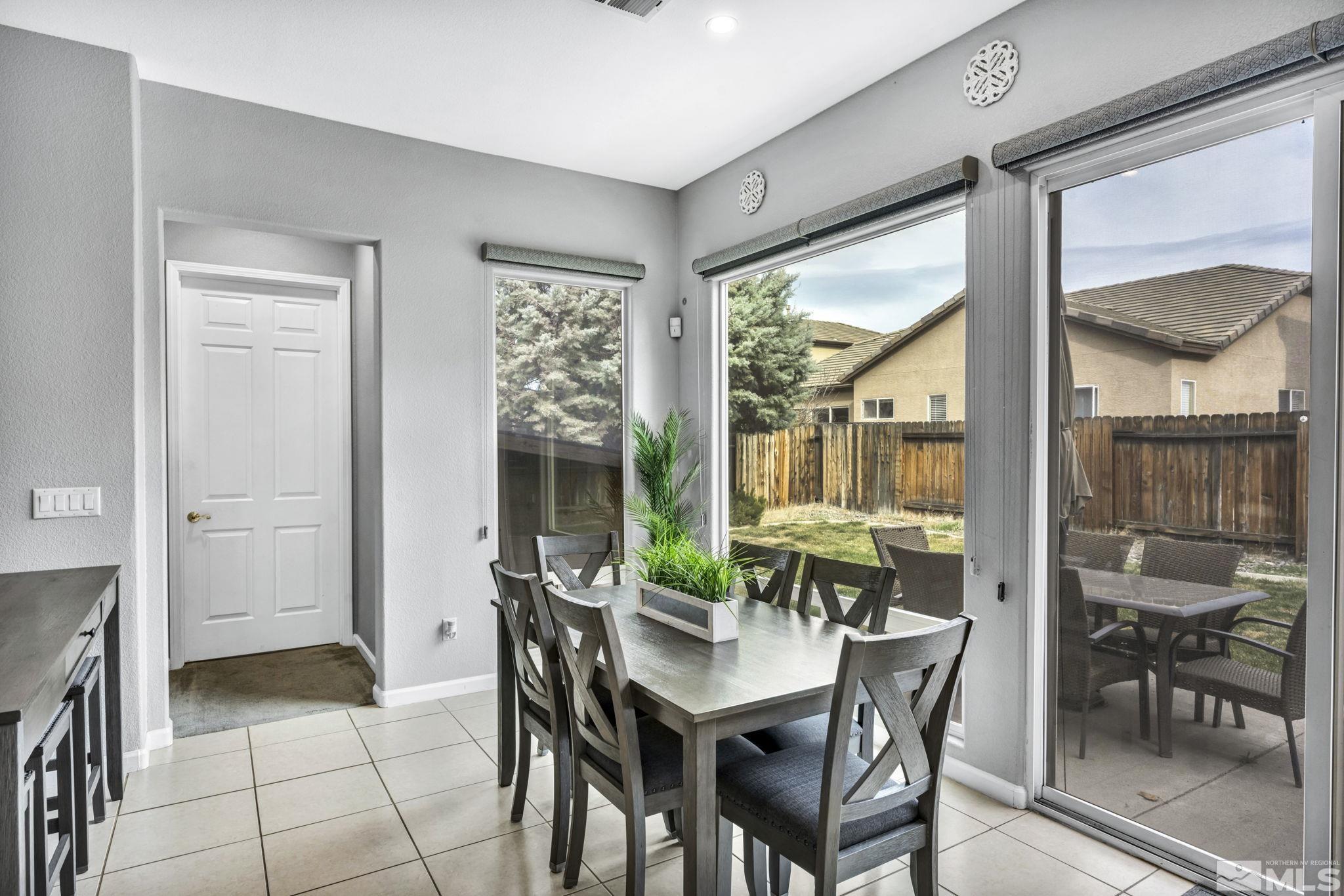 10518 French Meadows Way Reno, NV 89521 - Photo 28 of 34 a view of a dining room with furniture window and outside view