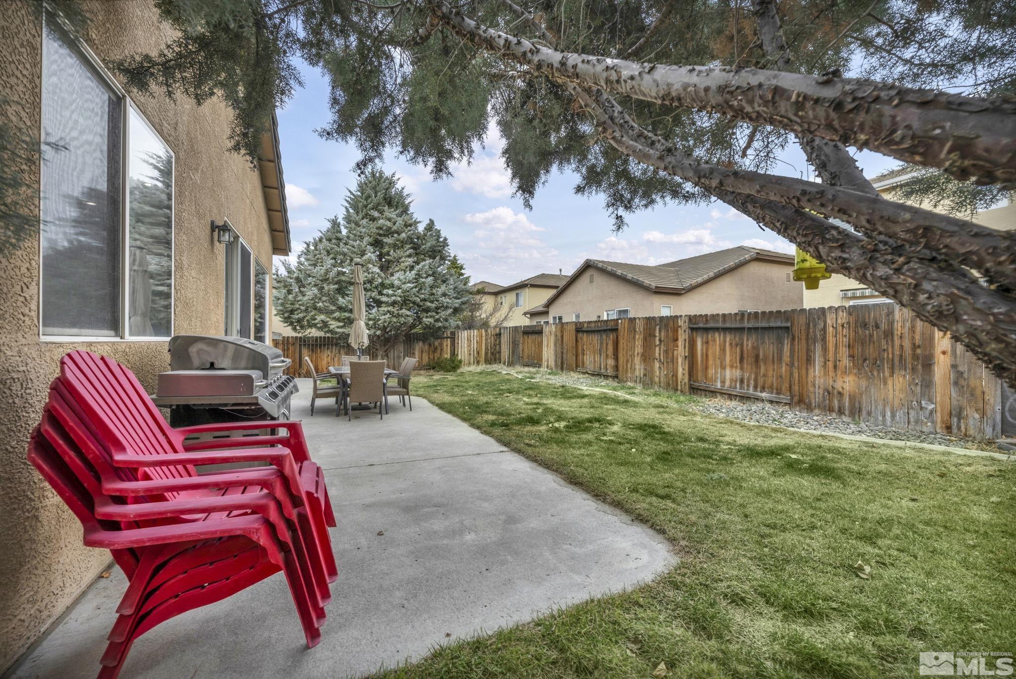 10518 French Meadows Way Reno, NV 89521 - Photo 5 of 34 a view of a house with backyard porch and sitting area